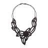 Paguro Upcycle black vegan inner tube necklace with intricate leaf-inspired cutout design