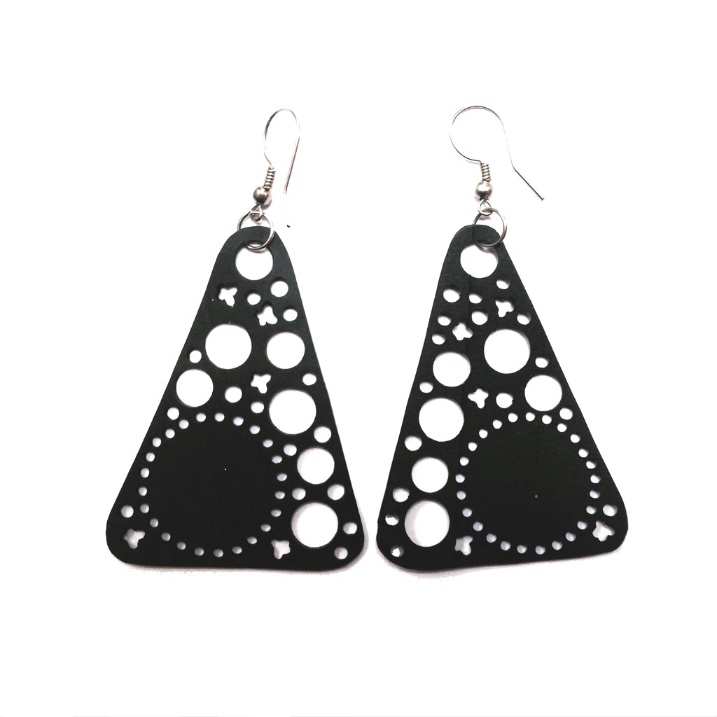 Paguro Upcycle black recycled rubber earrings with circular cutout design and silver hooks