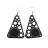Paguro Upcycle black recycled rubber earrings with circular cutout design and silver hooks