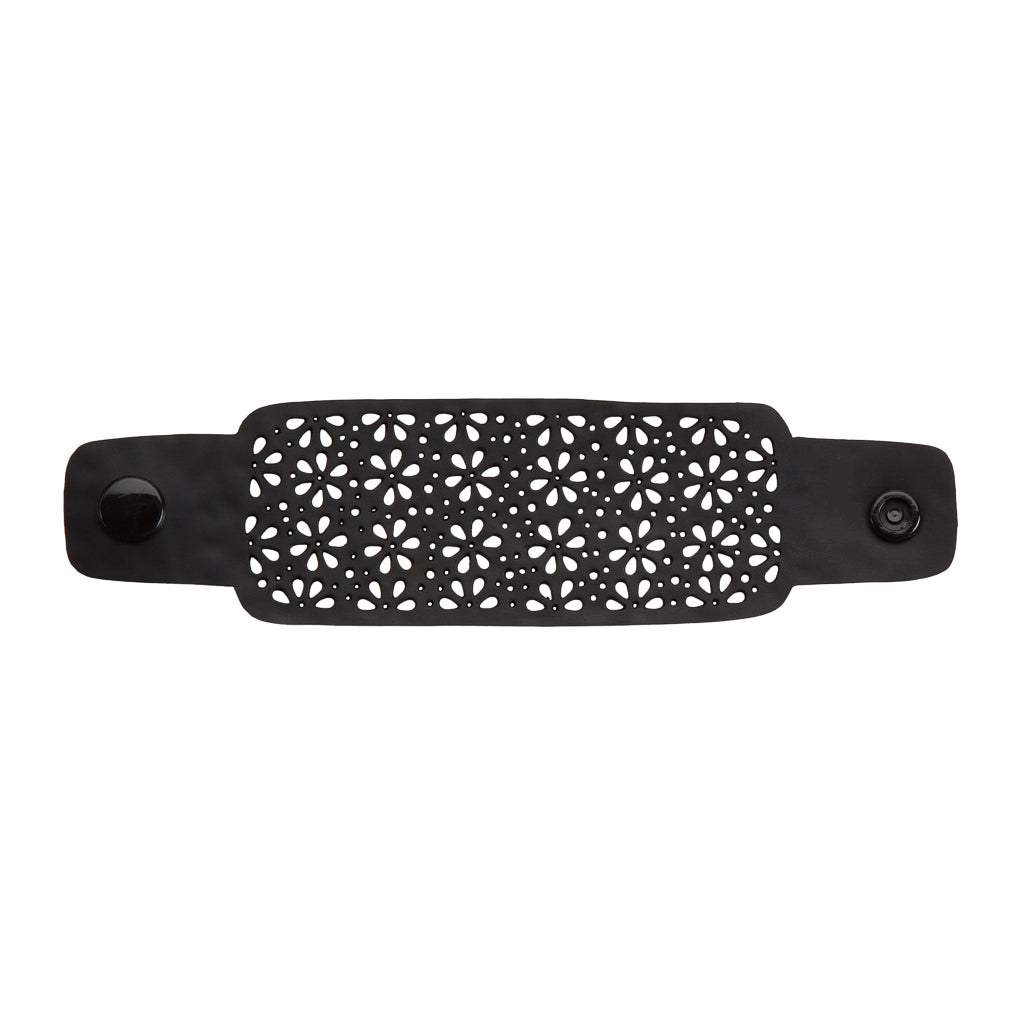 Paguro Upcycle black recycled rubber bracelet with floral cutout design and snap closure