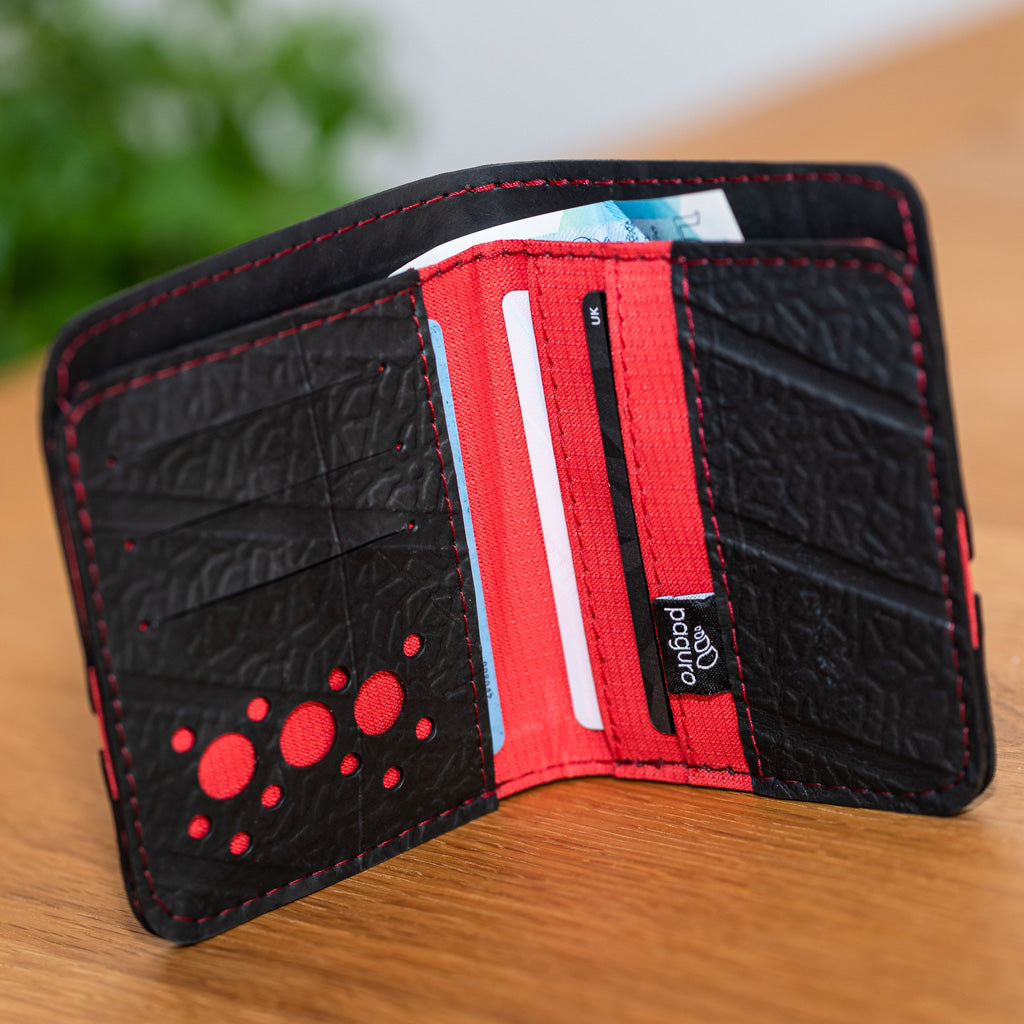 Paguro Upcycle eco friendly recycled inner tube wallet with card slots and vibrant red lining