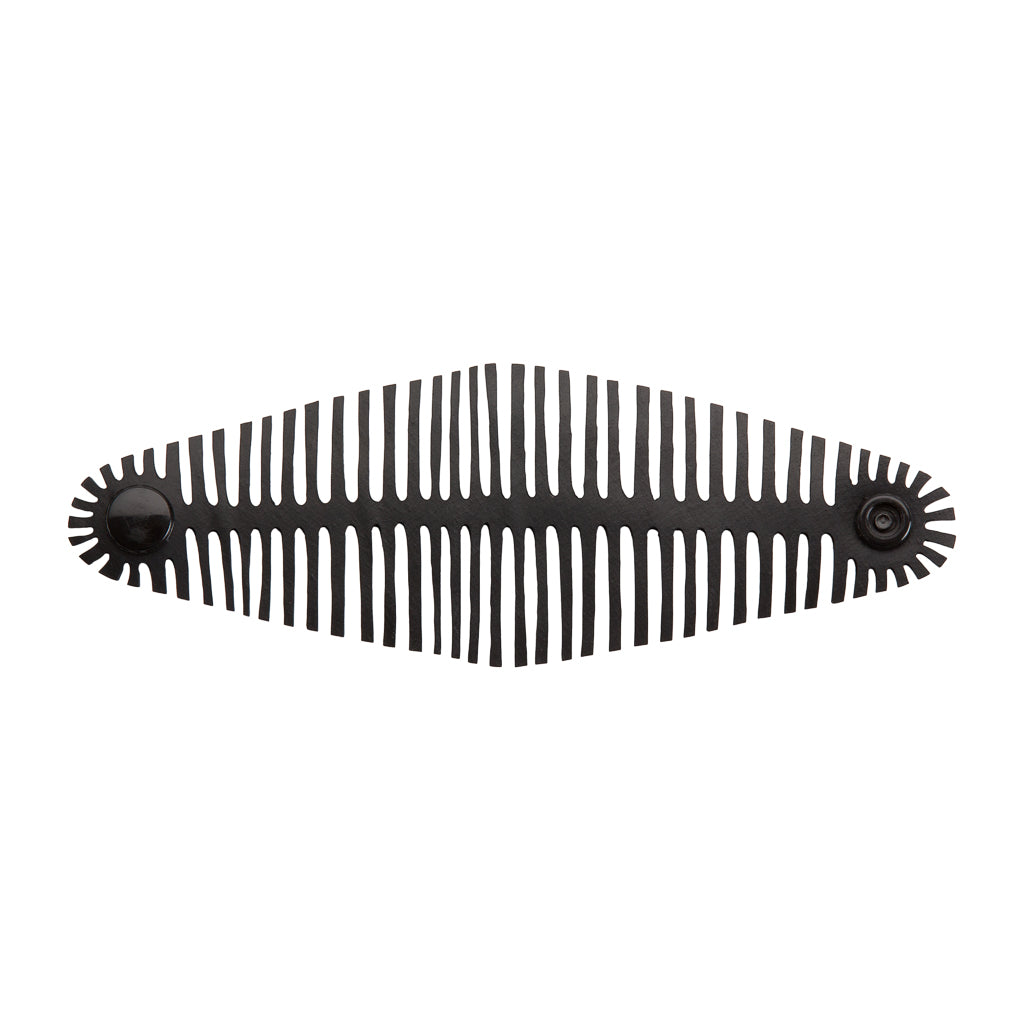 Paguro Upcycle black slotted cuff with snap closure recycled rubber bracelet for eco friendly style
