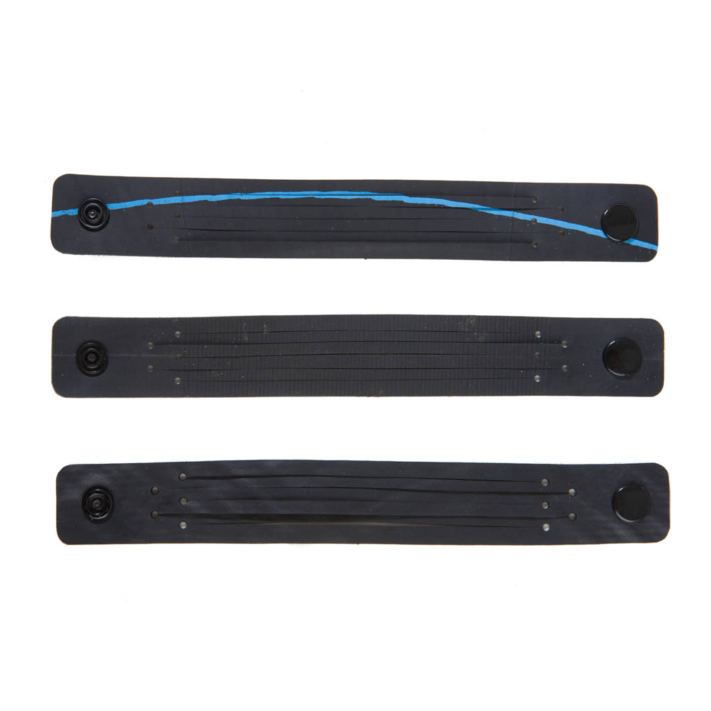 Paguro Upcycle recycled rubber bracelet set featuring black bands with blue details and snap closures