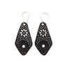 Paguro Upcycle black recycled rubber earrings with floral cutout design and silver hooks