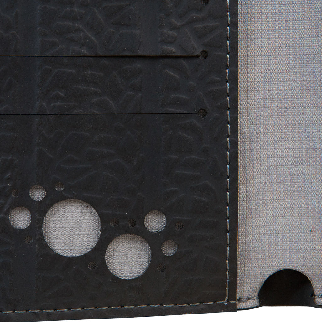 Paguro Upcycle black upcycled inner tube wallet with card slots and circular cutout design